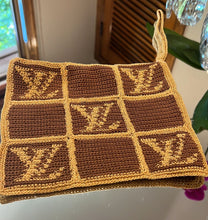 Load image into Gallery viewer, Crocheted designer wristlet
