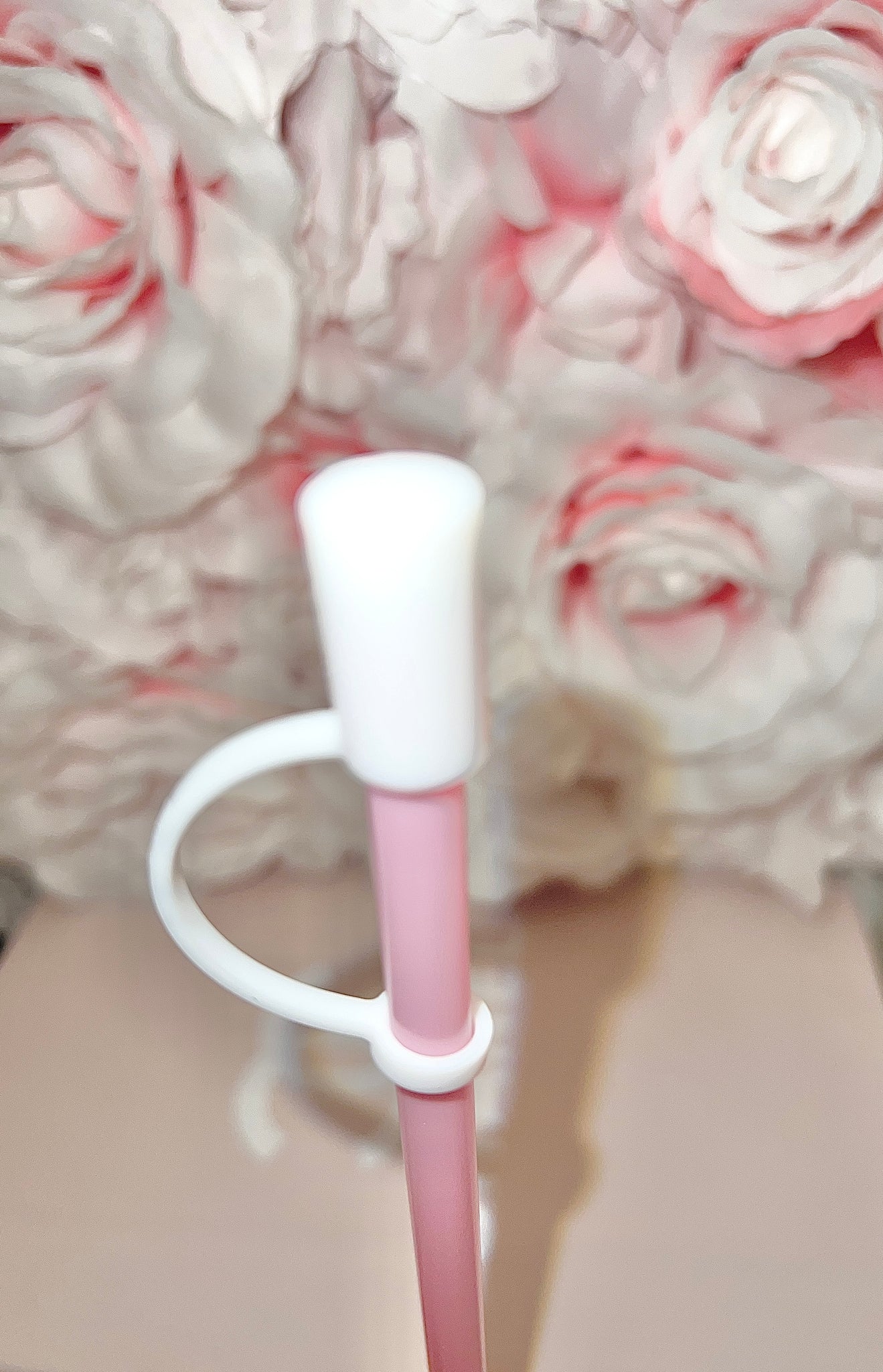 White Silicone straw cover.