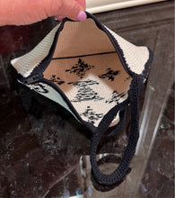 Load image into Gallery viewer, Crocheted designer wristlet
